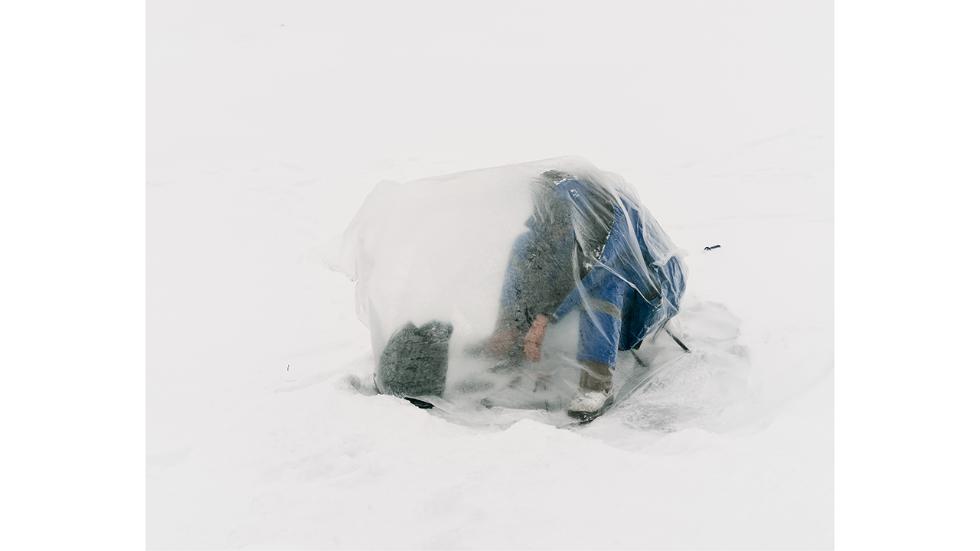 Detroit-based photographer Aleksey Kondratyev, 22, spent two months this winter photographing the fishermen of the frozen Ishim River in Kazakhstan’s capital city of Astana. Wrapped in giant plastic bags to shield themselves against frigid winds, these fi