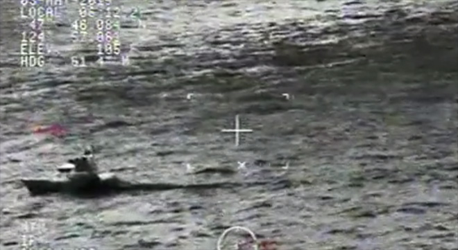 Boat off of Quillayute River (Image of rescue provided by Coast Guard) 