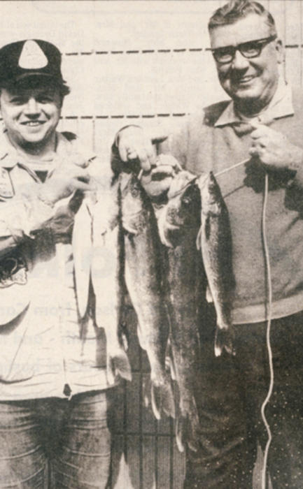 Al Skaar (left) of Alexandria and Dick Dyke were all smiles with a stringer of walleyes they caught on Lake Chippewa near Brandon during the Minnesota opener in 1975. (File photo)