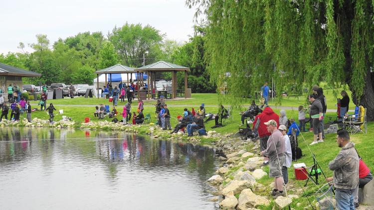 Some people arrive early to get their favorite spot along the banks the Bevier Park pond for the annual Waukegan Park District Fishing Derby, which is scheduled for Saturday, June 4. (Waukegan Park District)