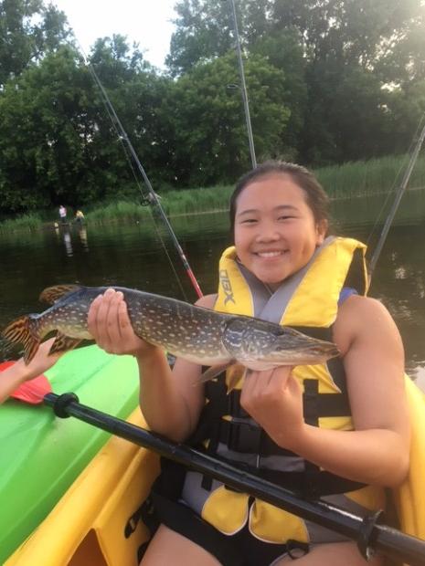 Cecilia Huynh, 17, of St. Paul caught this northern pike while fishing the Rice Creek Chain of Lakes May 31. (Photo courtesy Phuoc Huynh)