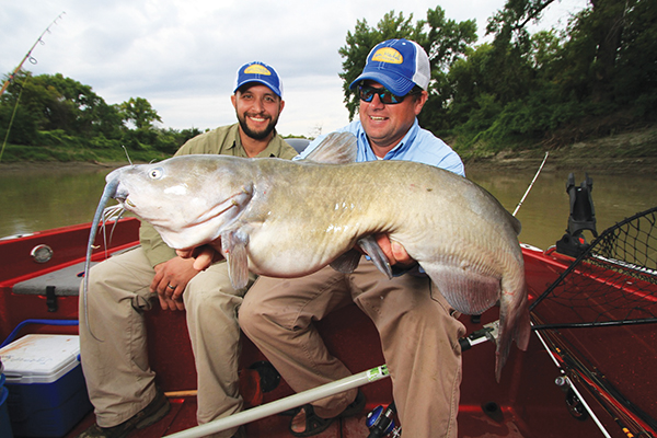 Red River guide Josh Burgett and Jason Mitchell with a giant Red River Channel Cat caught while filming an episode of Jason Mitchell Outdoors TV.