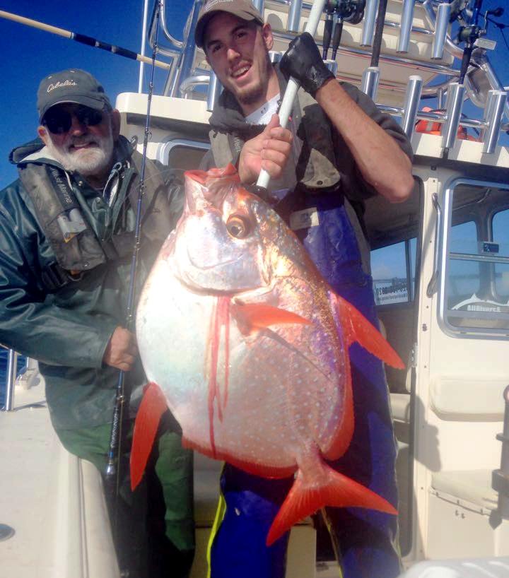 Washington state-record opah, also called moonfish, caught out of Westport on Sept. 27, 2015, weighs 36 pounds. At left is angler Jim Watson of Coeur d&#039;Alene and deckhand Joel Torrison of All Rivers &amp; Saltwater Charters. (Courtesy)